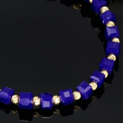 Stylisches, dehnbares Kugel-Armband mit Goldperlen in 585 14K und funkelnden, dunkelblauen Beads