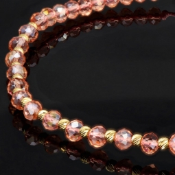 Trendiges, längenverstellbares Kugel Zug-Armband mit Goldperlen in 585 14K und funkelnden, transparenten, rosa Beads zum Schnäppchenpreis